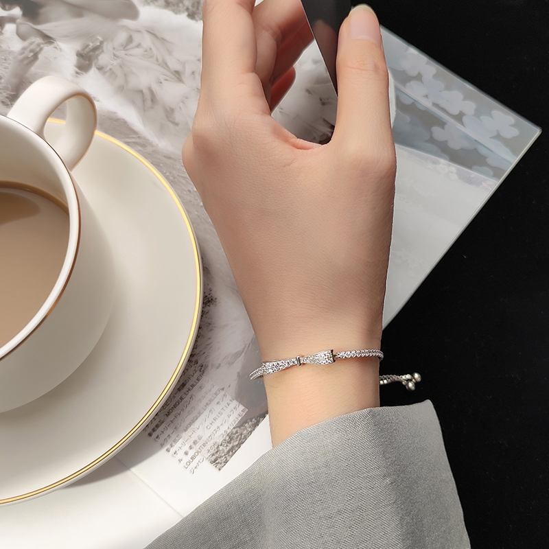 Gelang Tangan Silver Wanita Desain Pita Hias Zircon Adjustable Untuk Hadiah Ulang Tahun