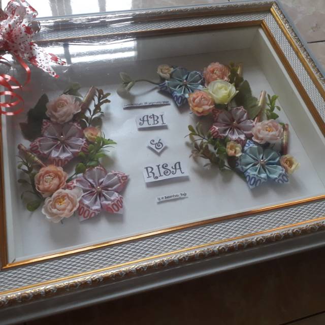 Mahar uang pigura uang