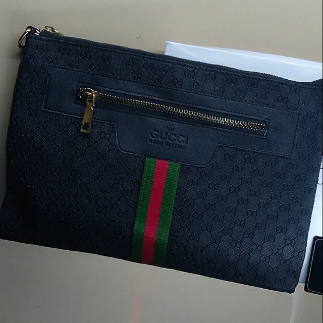 tas ck/ guci