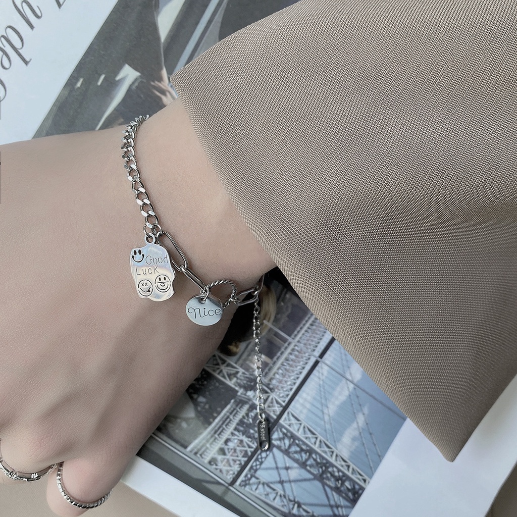 Jepang dan Korea sederhana in titanium steel gelang pria dan wanita kepribadian lucu wajah tersenyum