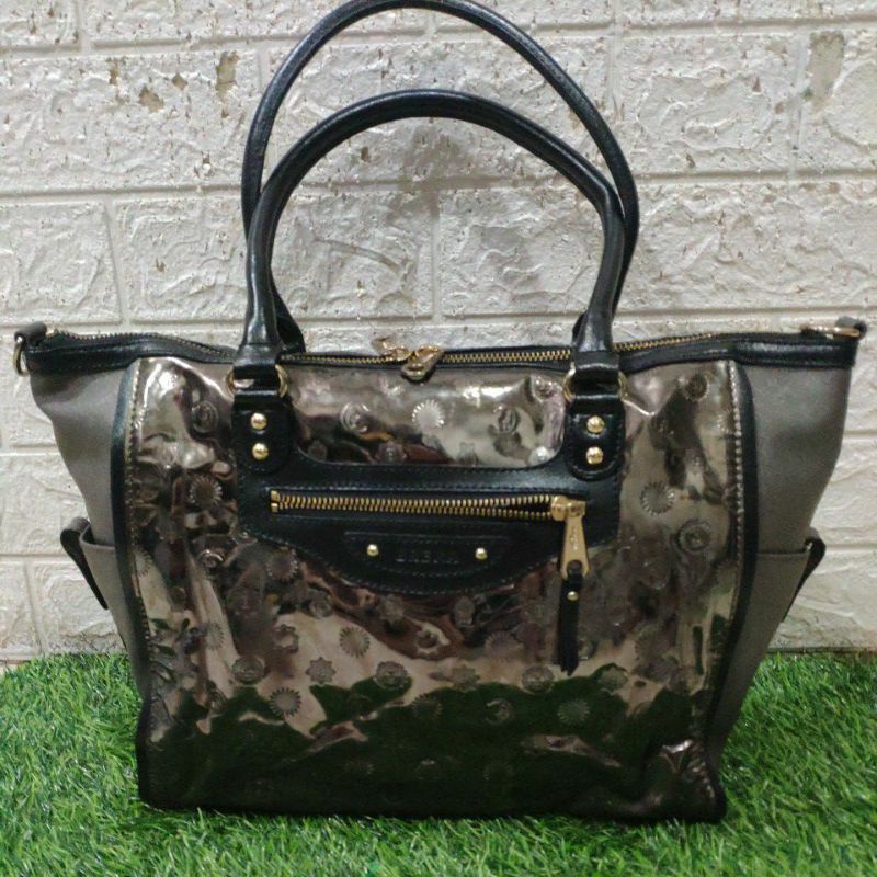 tas Brera glossy