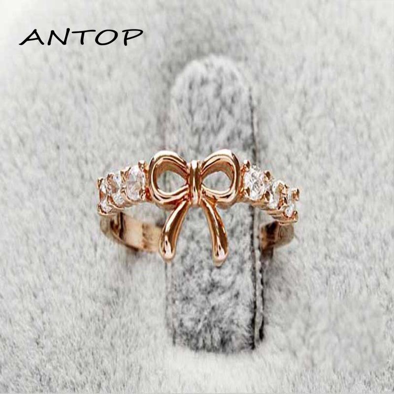 Cincin Korea Emas Cincin titanium Pria Wanita aesthetic keren Desain Pita Aksen Berlian Ring Jewelry ANTOP