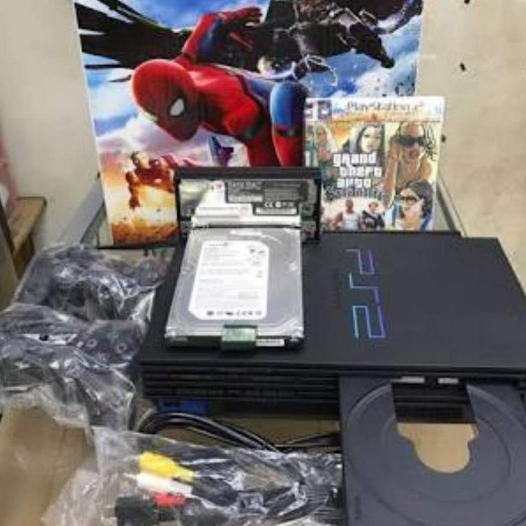 Sony PS2 Optik + 10 CD Game + Hardisk Internal 160gb + 2 stik