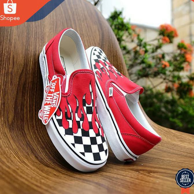 red flame slip on vans
