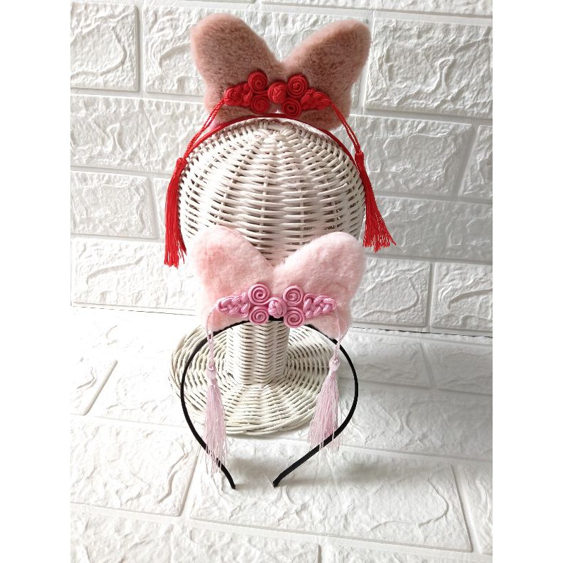 bando Imlek bulu kancing