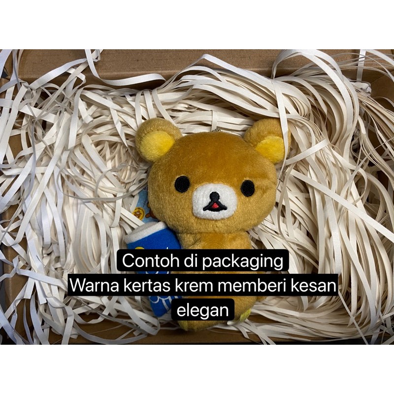 

Gift Box Filler Kertas bookpaper krem muda cacah / potong / shredded / isian parcel / kertas serut