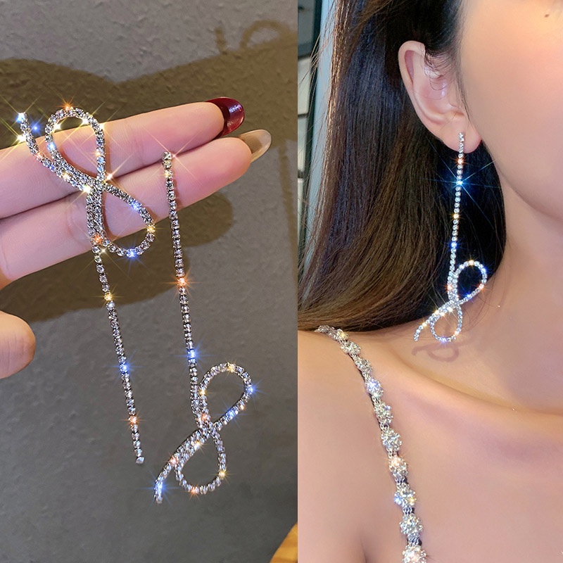 Anting Tusuk Gantung Asimetris Desain Pita Hias Berlian Gaya Jepang / Korea / Elegan / Trendy Untuk Wanita