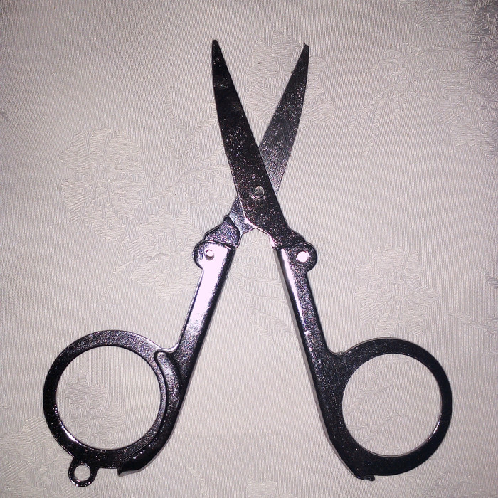 

Gunting Lipat
