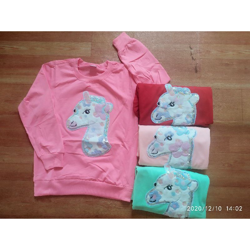 sweater anak import unicorn