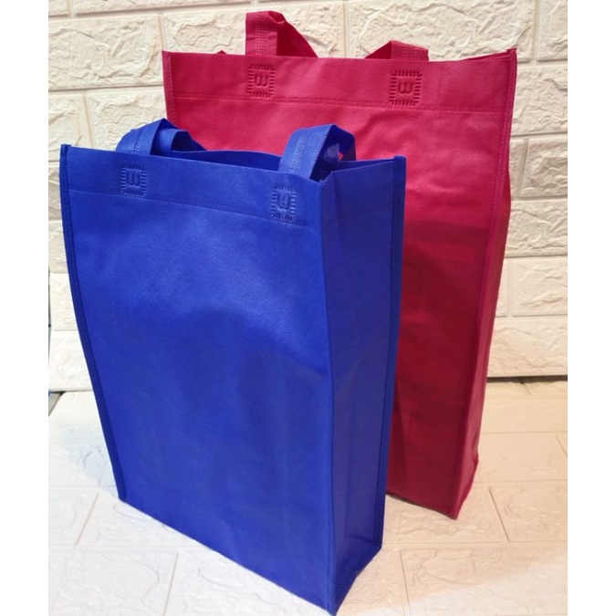 

Goddie bag bahan spondbond/Handle box jahit 25x35x10 & 30x40x10 isi 12pcs