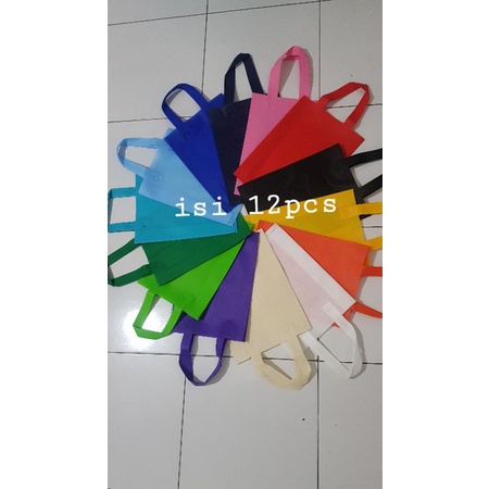 

Standing Handle bag/tas spounbond 25x35x8(Harga perlusin isi 12pcs/pack)