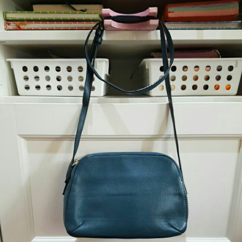 Preloved sling bag kecil Della Stella