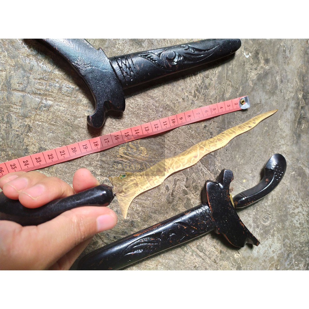 keris kuningan kecil
