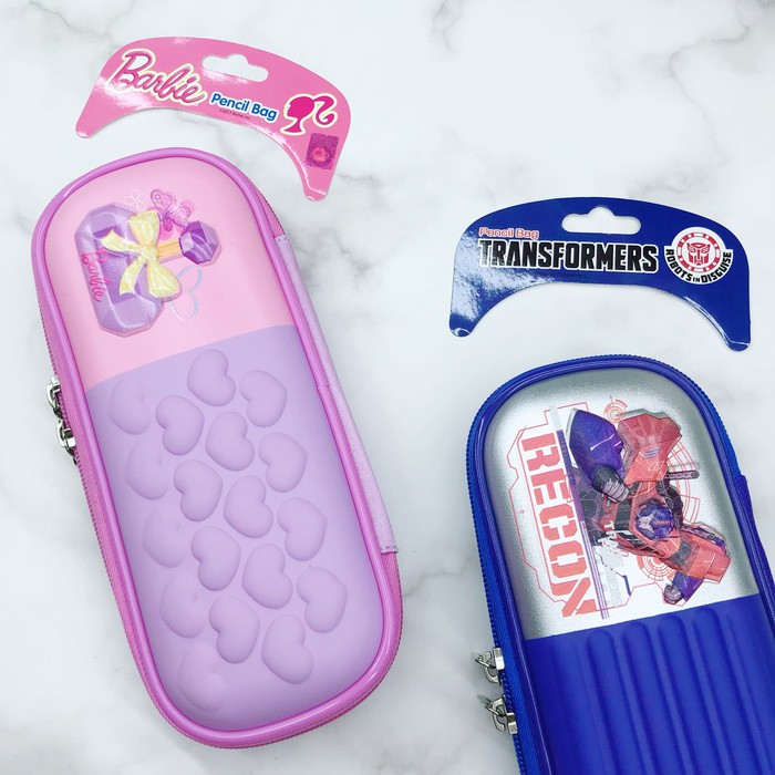 

Kotak pensil model smigle transformers x barbie