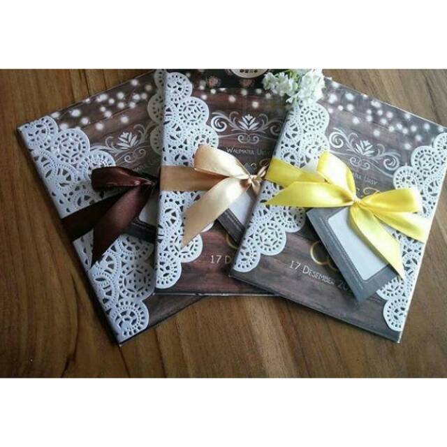 

Undangan coklat kertas doly