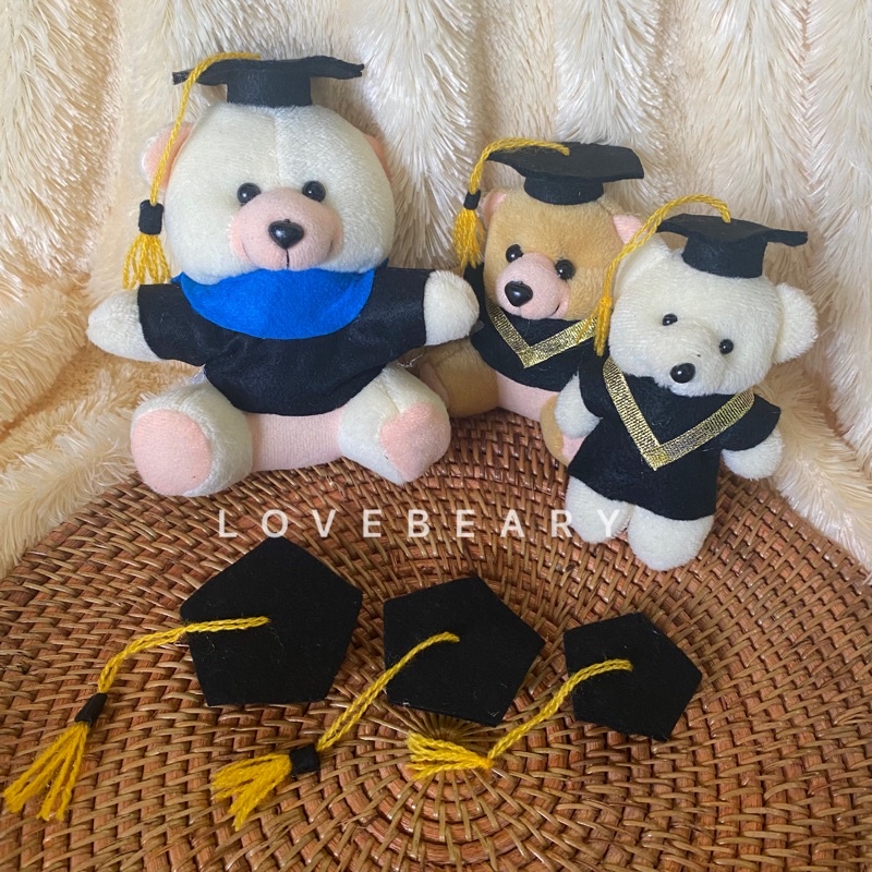 TOPI TOGA BONEKA BENTUK SEGILIMA