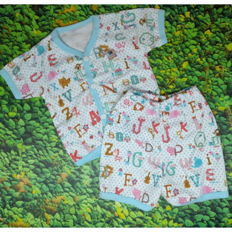 Stelan Baju Bayi Tangan Pendek Kancing Depan Uk No.12-18