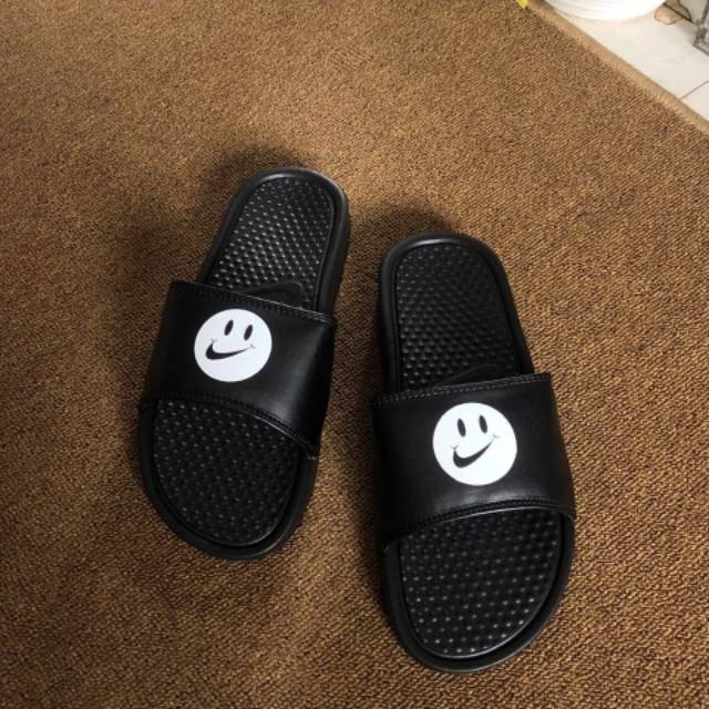 nike smiley face slides