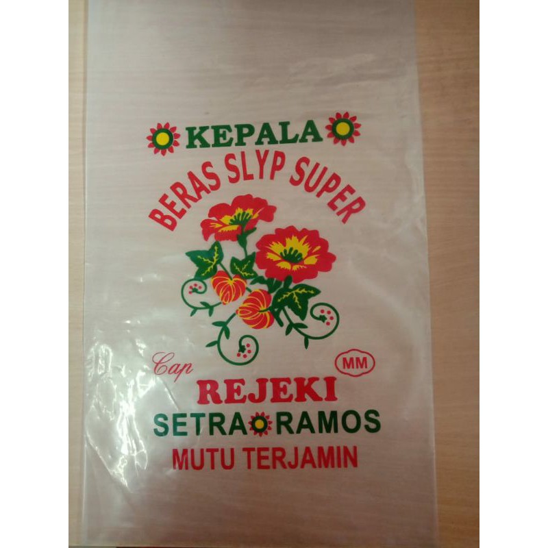 

kemasan beras 5 kg cap kembang rejeki (ini bukan beras)