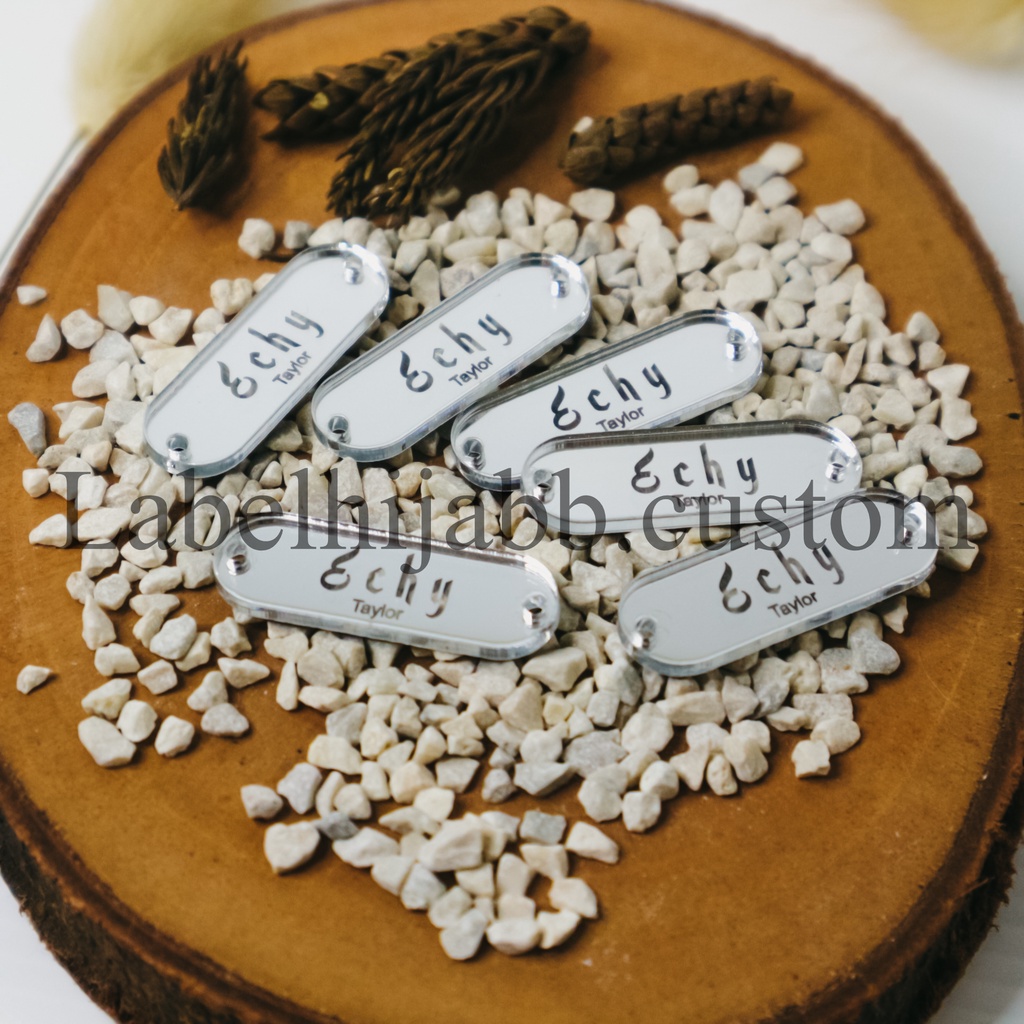 

label hijab | label baju | label akrilik | custom label | label jilbab | label cutting | label Cantik