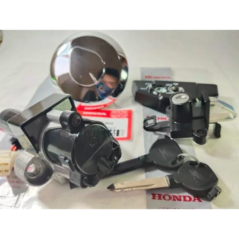 Kunci kontak dan tutup tangki - jok Honda Mega Pro New Monoshock - Primus - Karburator original AHM 