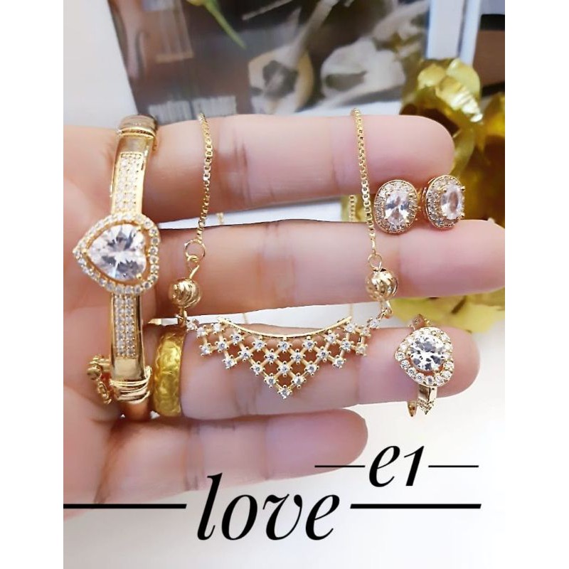 new set dewasa.perhiasan  xuping & titanium murah terlaris surabaya.grosir lebih murah