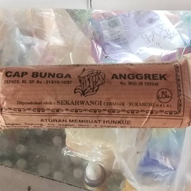 

Hun Kwe / Hunkue Cap Bunga Anggrek