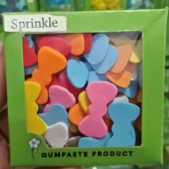 

Gumpaste Sprinkle Pita 1 Kotak (30gr) Hiasan Fondant Bentuk Dasi Kupu-Kupu Warna-Warni