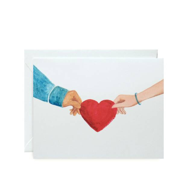 

Hands Holding Heart Card