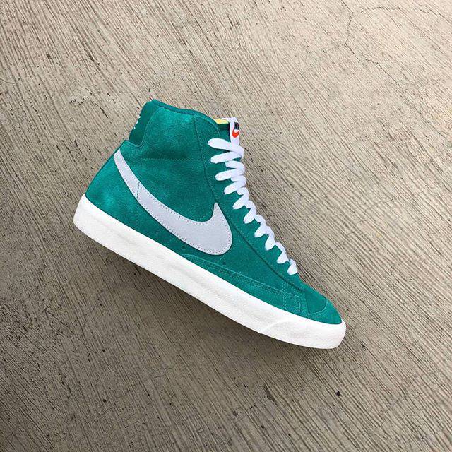 branded white sneakers