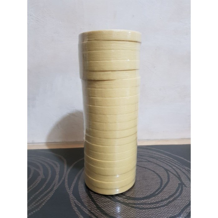 

perekat-pengikat- masking tape 12 mm / lakban kertas 12 mm -pengikat-perekat.