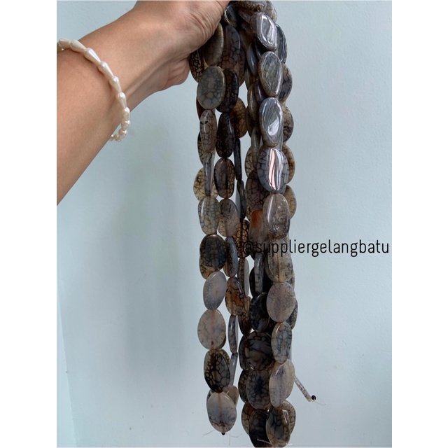 batu Penden simba oval rhodolite dalmantion 2 x 4 cm hitam putih serat