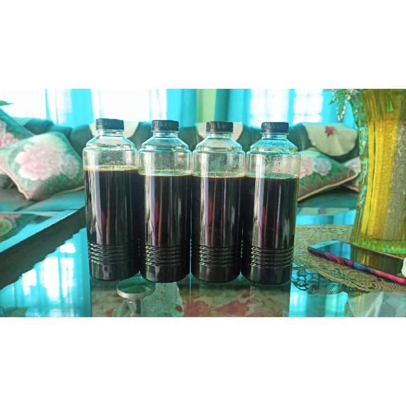 

Madu Hitam Asli Mandau 500 gram