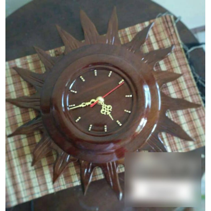 Jam dinding kayu jati bentuk matahari