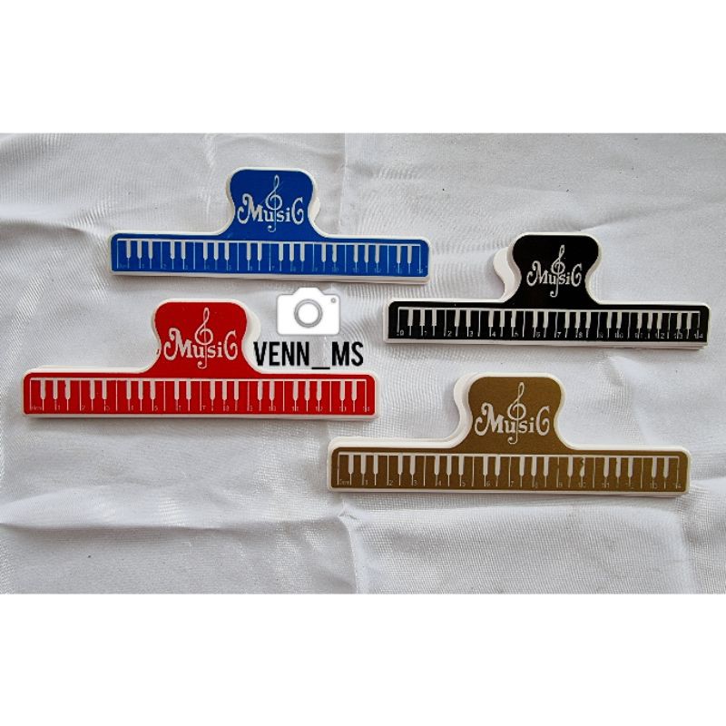 

PENJEPIT PARTITUR CLIP BOOK