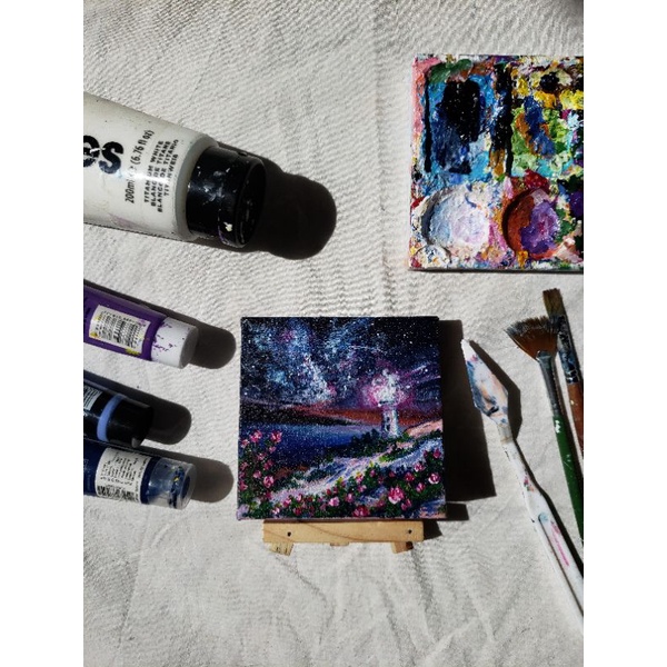 

Mini Canvas Painting + Easel: Cosmic Lighthouse