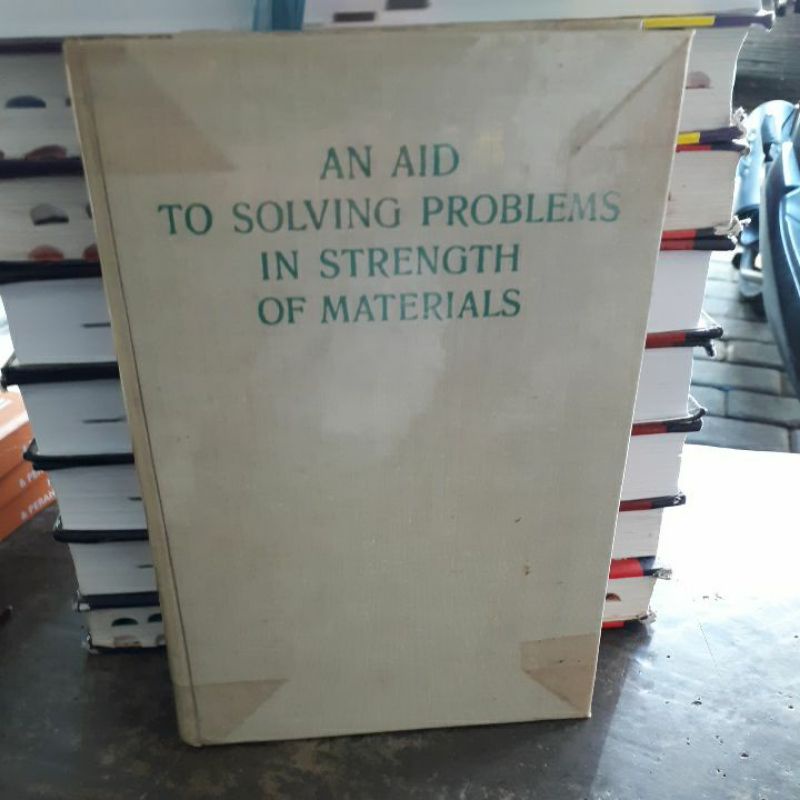 

BUKU ORIGINAL AN AID TO SOLVING PROBLEMS IN STRENGTH OF MATERIALS