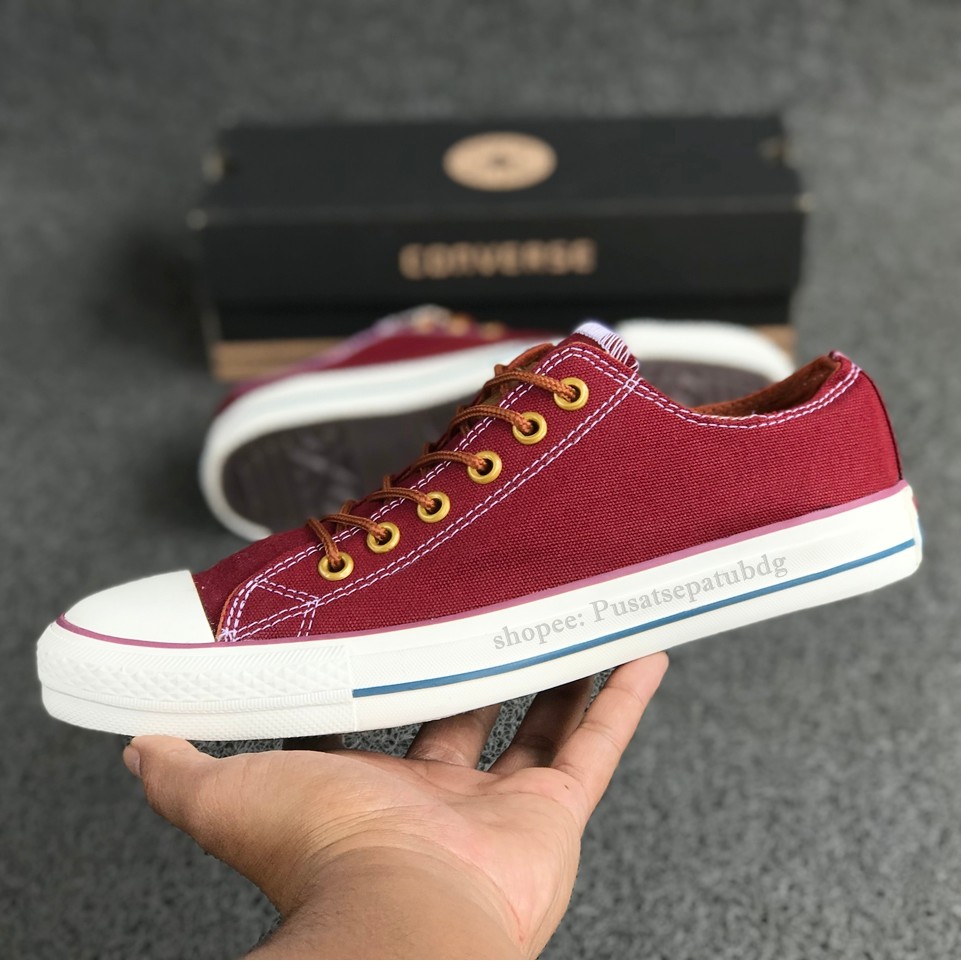 tan low top converse