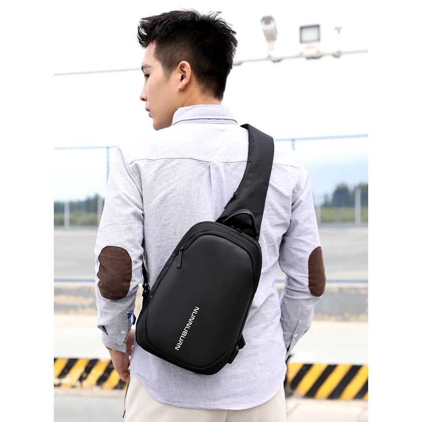 Nunnuburn Tas Selempang Sling Bag Oxford dengan USB Charger Port - 817