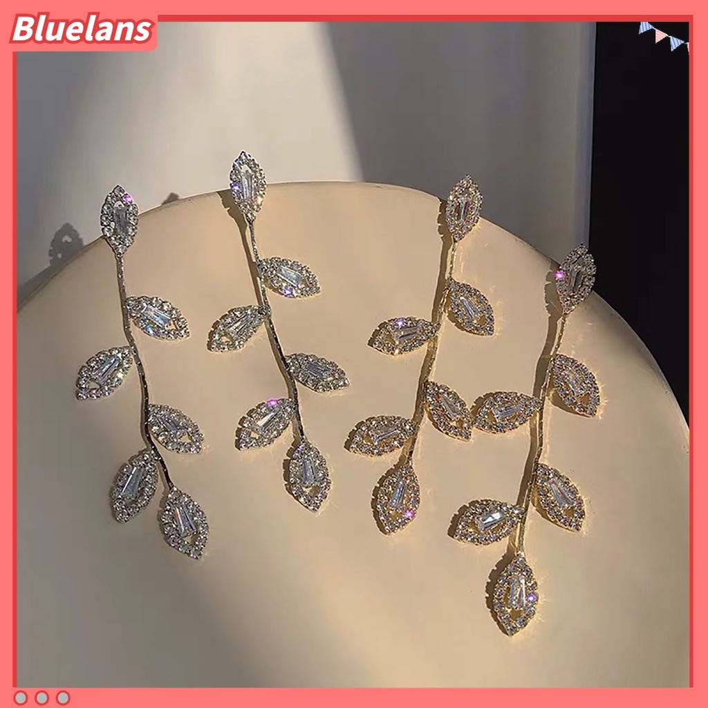 1 Pasang Anting Stud Cubic Zirconia Bentuk Daun Bahan Alloy Untuk Wanita