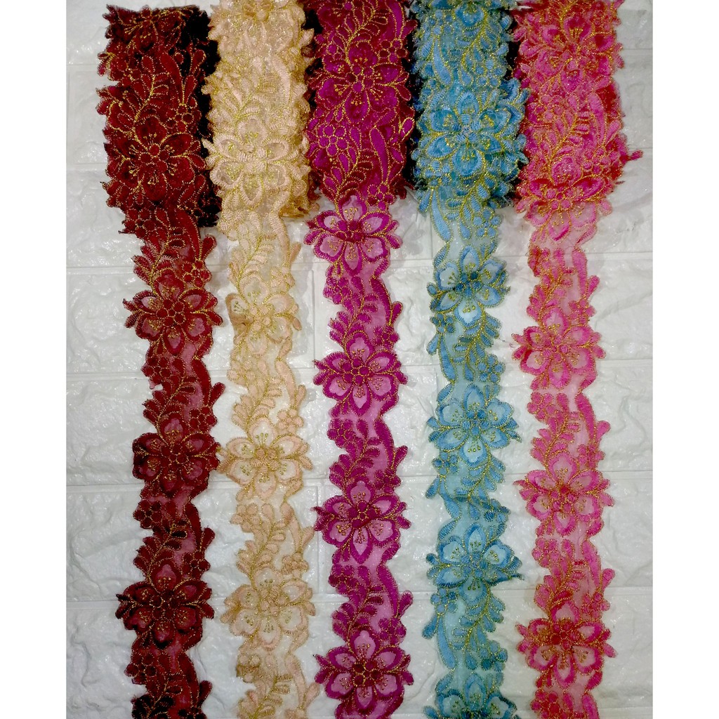 Renda bordir roll bunga timbul komb emas