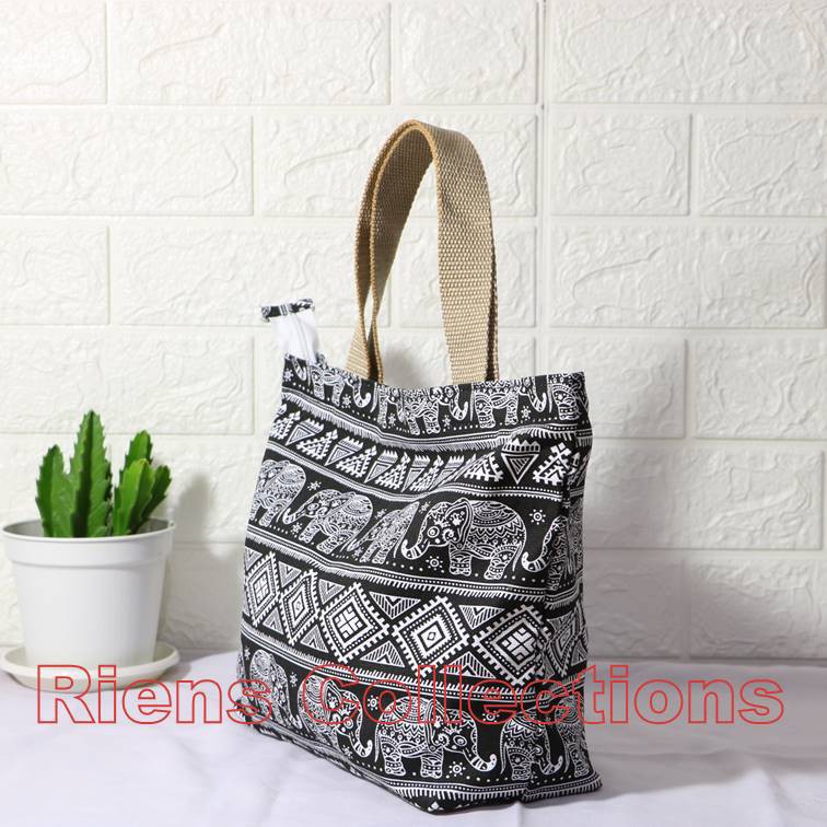 RIENS COLLECTIONS. TAS KANVAS HANDBAG KANVAS BESAR MOTIF GAJAH LATAR HITAM