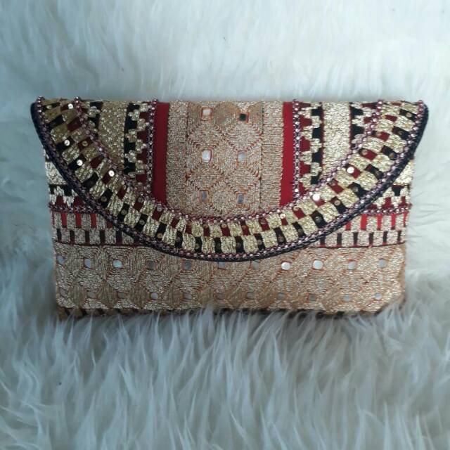 Clutch Tapis full