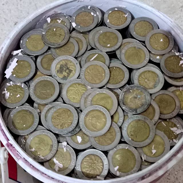 Uang lama kuno 1000 kelapa sawit