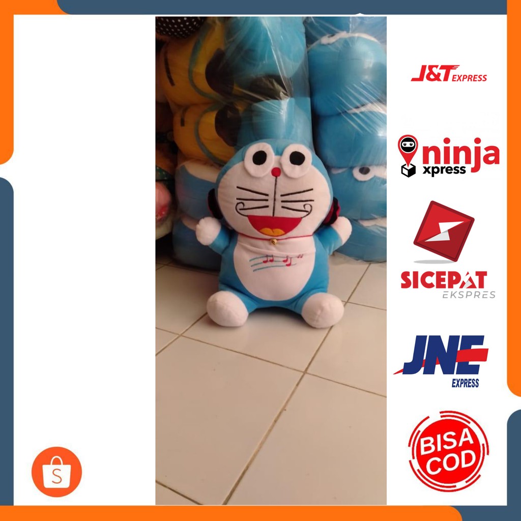 BONEKA DORAEMON WALKMAN LUCU MURAH