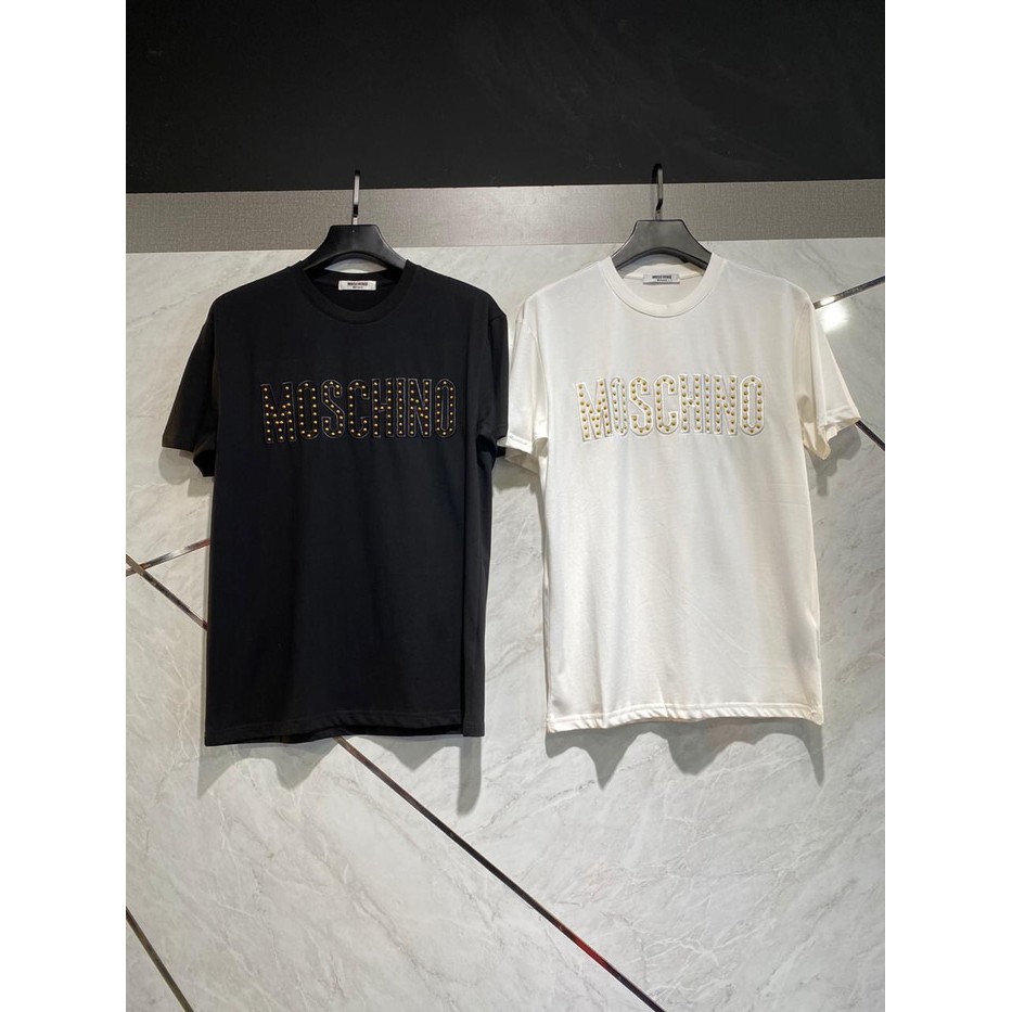 

Unik Moschino Gold Writting Black / White Shirt Berkualitas