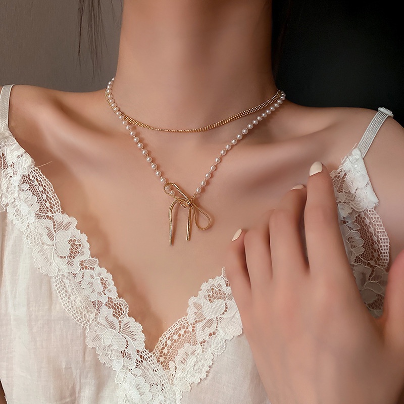Kalung Rantai Model Rumbai Aksen Bunga Mutiara Dan Berlian Gaya Retro Untuk Wanita