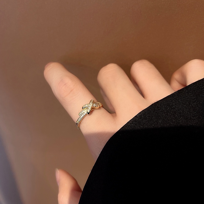 cincin wanita Color-preserving electroplating Korean version of simple and fashionable cross letter X geometric bow open ring