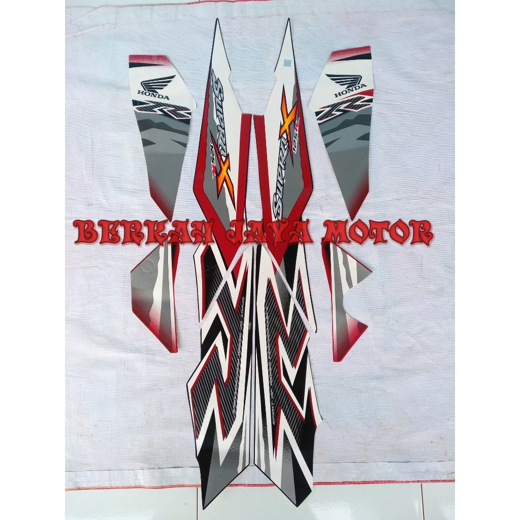 STRIPING STICKER LIS BODY MOTOR SUPRA X 125 TAHUN 2011 2012 HITAM MERAH