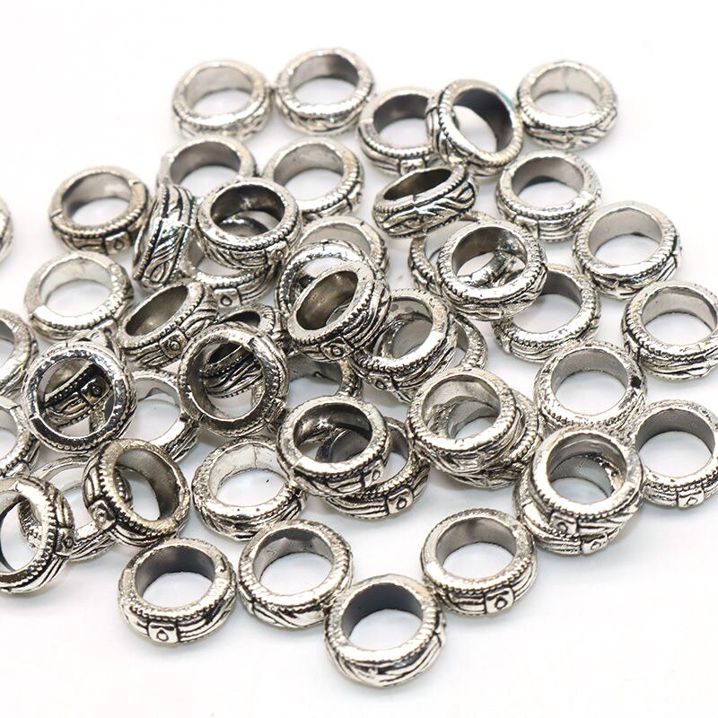 50pcs / lot Manik-Manik Roda Spacer Lubang Besar 9mm Warna Silver Gaya Vintage Untuk Membuat Perhiasan Gelang